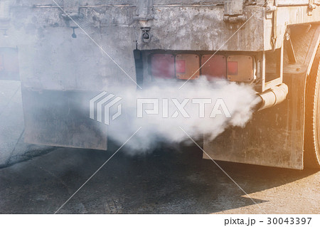 The smoke from the truck exhaust.soft focus 30043397