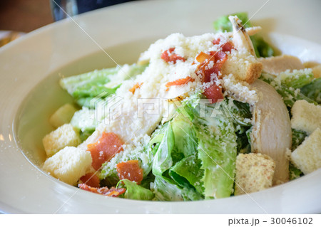 Caesar salad with chicken grilled Caesar salad with chicken grilled 30046102