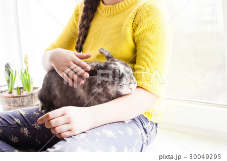Girl with her favorite pet 30049295