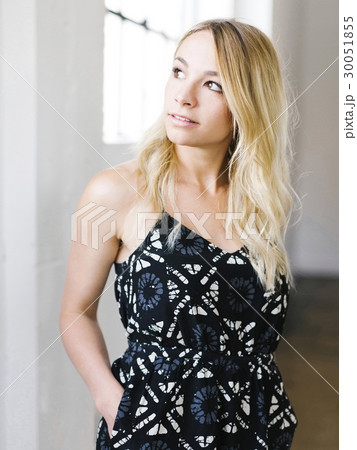Portrait of young blond woman contemplating Portrait of young blond woman contemplating 30051855