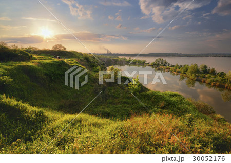Ukraine, Dnepropetrovsk, Landscape with pond and hills at sunset Ukraine, Dnepropetrovsk, Landscape with pond and hills at sunset 30052176