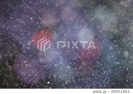Snowfall texture of snowflakes on blurred background 30052863