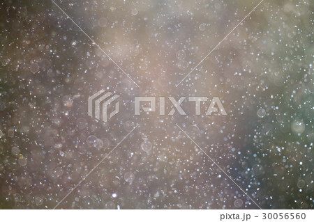 Snowfall texture of snowflakes on blurred background 30056560