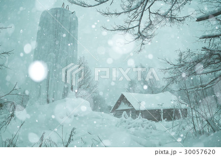 rural landscape with small houses on a snowy day 30057620