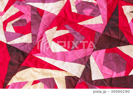 Part of color patchwork quilt with purple flowers 30060290