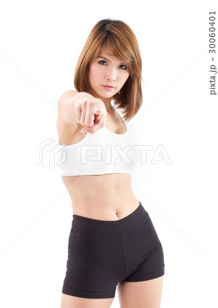 strong sporty woman pointing at you strong sporty woman pointing at you 30060401