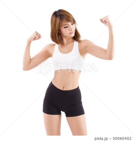 strong, fit, firm woman checking her arm muscle strong, fit, firm woman checking her arm muscle 30060402