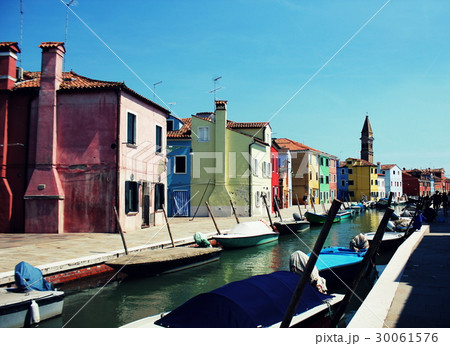 Street with colorful buildings in Burano island Street with colorful buildings in Burano island 30061576