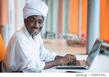 Sudanese business man in traditional outfit using Sudanese business man in traditional outfit using 30067842