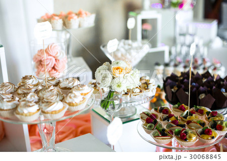Delicious baked baskets with cream and 30068845