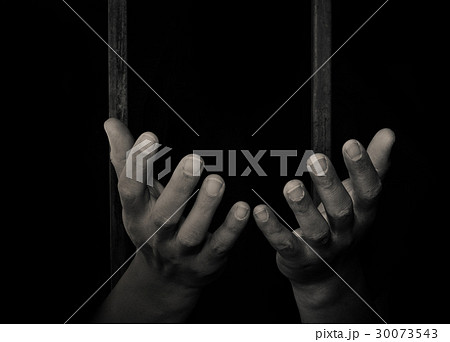 A hand sticking out of a detention attempt. 30073543