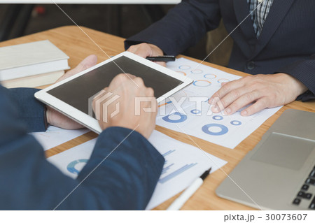 businessmen using touchpad and analysis chart 30073607