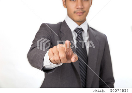 Businessman standing and pointing at camera ov Businessman standing and pointing at camera ov 30074635