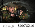 Portrait of the soldier with the gun in hands 30078210