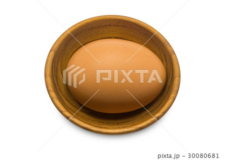 Single egg in a wooden bowl Single egg in a wooden bowl 30080681