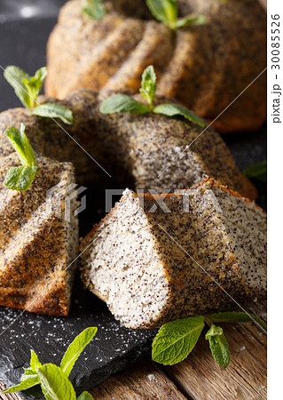 Delicious pound cake with poppy and mint macro Delicious pound cake with poppy and mint macro 30085526