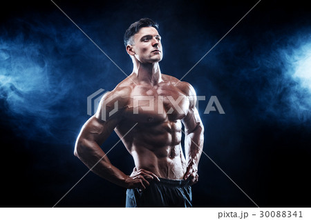 Strong bodybuilder man with perfect abs, shoulders Strong bodybuilder man with perfect abs, shoulders 30088341