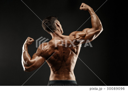 Back view of Unrecognizable man, strong muscles 30089096