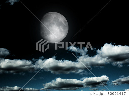 The moon in the night sky in clouds 30091417
