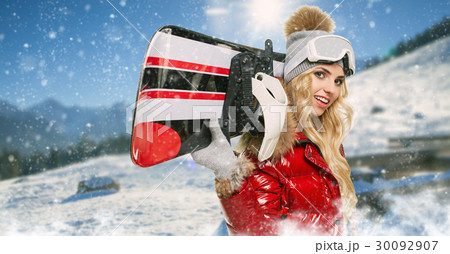 Smiling woman with snowboard Smiling woman with snowboard 30092907