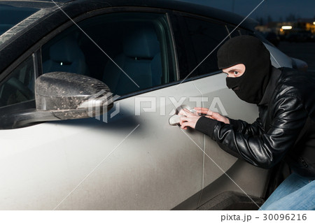 Carjacking danger, car insurance concept 30096216