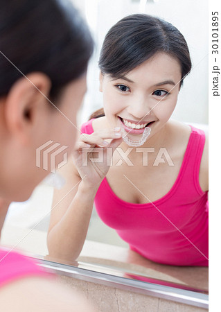 woman with invisible braces woman with invisible braces 30101895