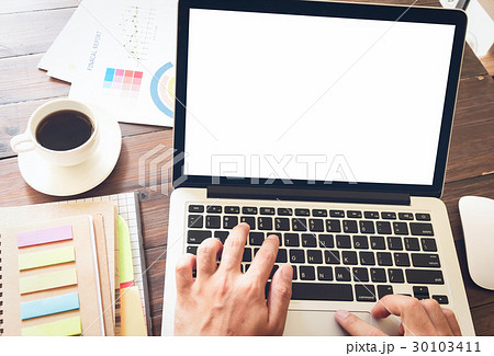 businessman hand working laptop on wooden desk. businessman hand working laptop on wooden desk. 30103411