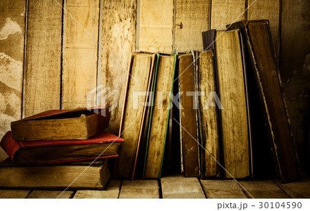 Old books on the wooden background. Old books on the wooden background. 30104590