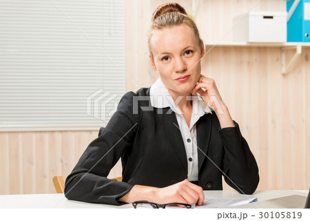 young beautiful and very successful woman at work 30105819