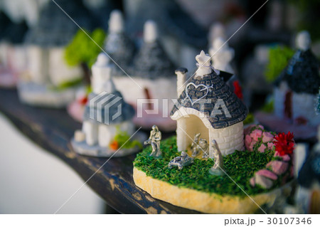 Close up of a ceramic Trulli houses Close up of a ceramic Trulli houses 30107346