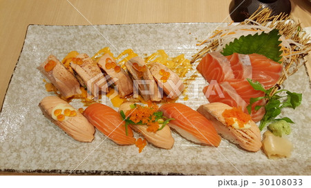 Salmon sushi and sashimi set on dish Salmon sushi and sashimi set on dish 30108033