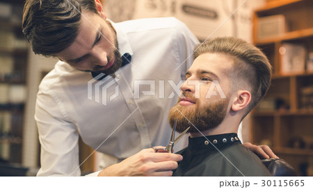 Young Man in Barbershop Hair Care Service Concept Young Man in Barbershop Hair Care Service Concept 30115665