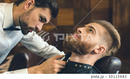 Young Man in Barbershop Hair Care Service Concept Young Man in Barbershop Hair Care Service Concept 30115683
