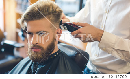 Young Man in Barbershop Hair Care Service Concept Young Man in Barbershop Hair Care Service Concept 30115700