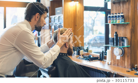 Young Man in Barbershop Hair Care Service Concept Young Man in Barbershop Hair Care Service Concept 30115733