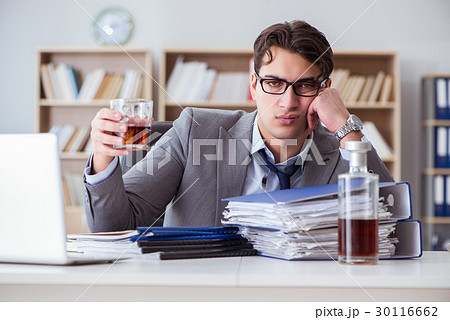 The businessman drinking in the office 30116662