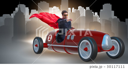 The superhero businessman driving vintage roadster The superhero businessman driving vintage roadster 30117111