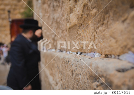 Religious orthodox jew praying at the Western Wall 30117615