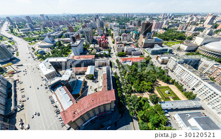 Aerial city view with roads, houses and buildings. Aerial city view with roads, houses and buildings. 30120521