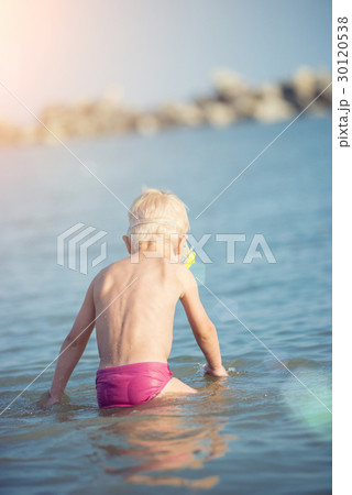 Cute little kid wearing mask and flippers for Cute little kid wearing mask and flippers for 30120538