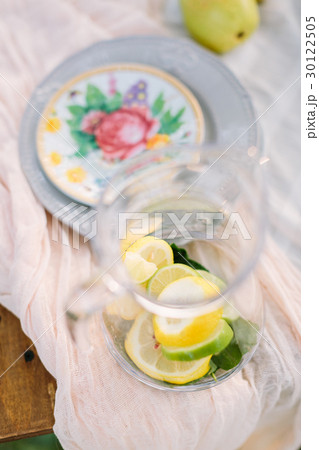 picnic, food, summer, holiday concept - glass 30122505
