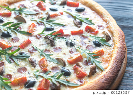 Cooked pizza Cooked pizza 30123537