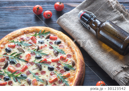 Cooked pizza with beer Cooked pizza with beer 30123542