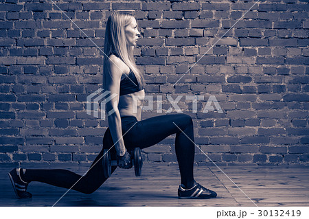 Woman doing fitness exercise 30132419
