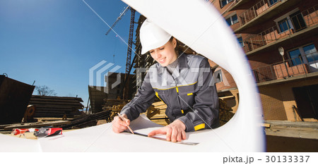 Female worker at a construction 30133337