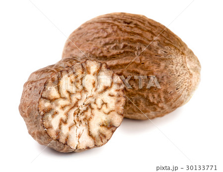 two nutmeg isolated on white background two nutmeg isolated on white background 30133771