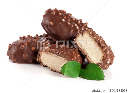 chocolate candy with nuts isolated on white chocolate candy with nuts isolated on white 30133863