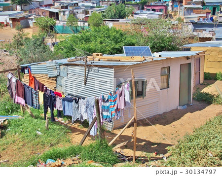 Solar panels on the roof at Informal settlement. 30134797