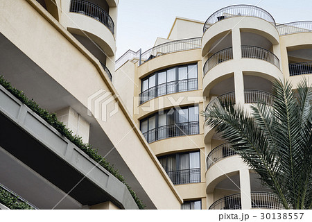 Balconies and windows on a contemporary building 30138557
