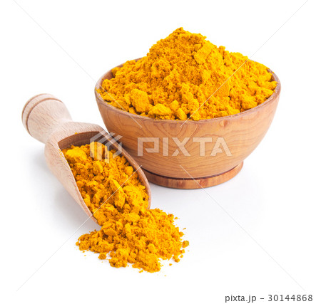 ground turmeric isolated on white 30144868